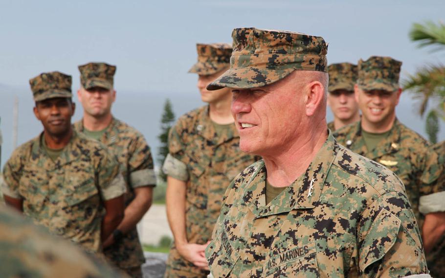 In his last official act as III Marine Expeditionary Force commander, Lt. Gen. Lawrence Nicholson meritoriously promoted five Marines and a Navy corpsman at Camp Courtney, Okinawa, Thursday, Aug. 2, 2018.