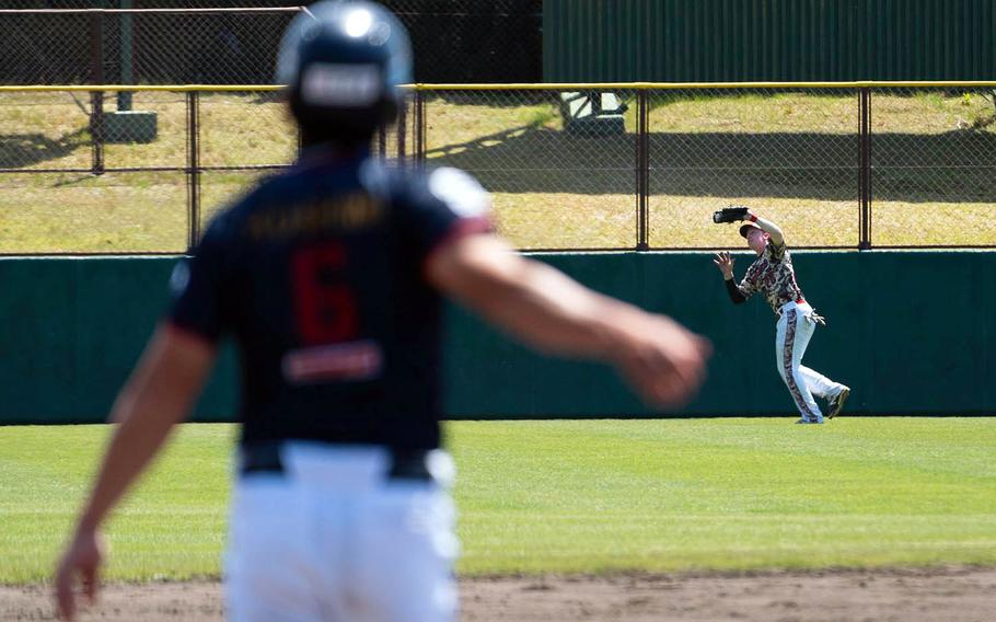 The Japan Military WarDogs play a Japanese team called the Fighting Birds earlier this year at Yokosuka Naval Base, Japan.