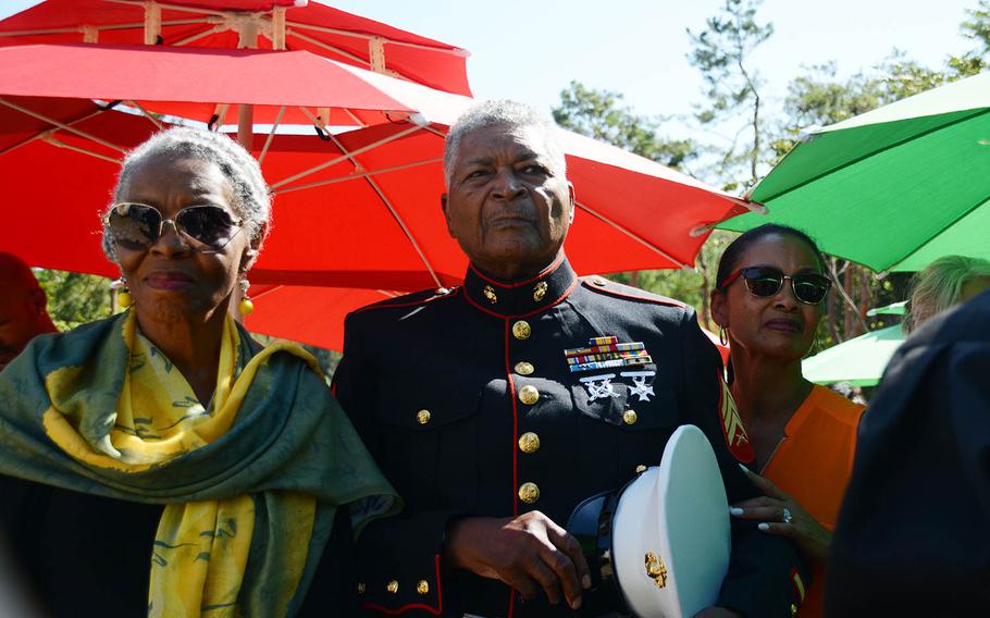 Theodore Bush Hudson Jr., center, a Korean War veteran who participated in the Marine landing at Incheon and the Chosin Reservoir campaign, stands with his wife and daughter during a ceremony honoring adoptees in Paju, South Korea, Sept. 12, 2018.
