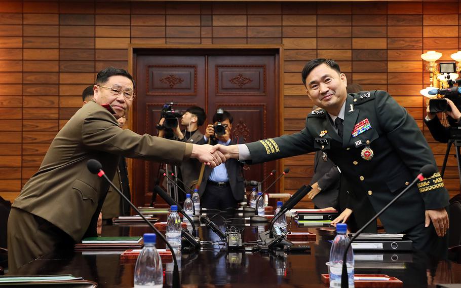 Maj. Gen. An Ik San, left, the chief delegate for North Korea, and Maj. Gen. Kim Do-gyun, the South Korean chief delegate, meet in Panmunjom, Friday, Oct. 26, 2018.
