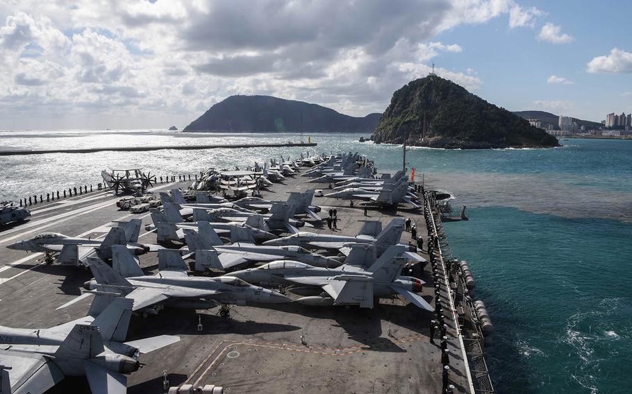 The USS Ronald Reagan maneuvers along the South Korean coast ahead of a port visit to Busan, Oct. 21, 2017.