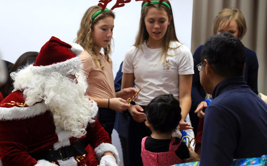 Help Oki, a group founded by former Marine Christopher Nesbitt and his wife, Yuko, threw a Christmas party for nearly 80 Okinawan orphans, Sunday, Dec. 9, 2018.
