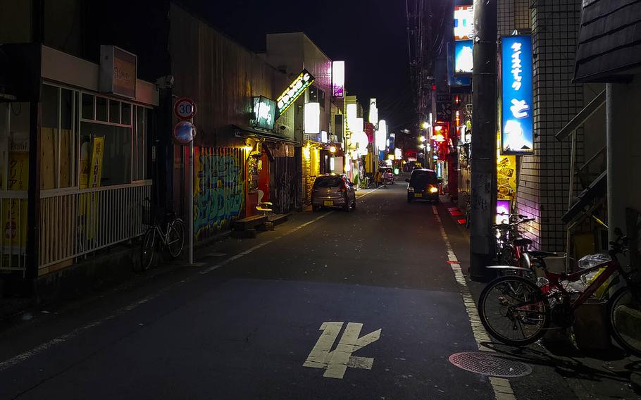 A nightlife area known as Bar Row near Yokota Air Base, Japan, was mostly empty Wednesday, Dec. 19, 2018, as local police step up patrols during the holidays.
