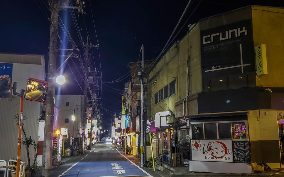 A nightlife area known as Bar Row near Yokota Air Base, Japan, has been feeling the effects of a crackdown by local police expected to last through the holidays.