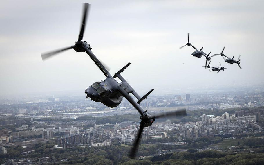 Air Force CV-22 Ospreys assigned to the 353rd Special Operations Group fly over Tokyo, April 5, 2018.