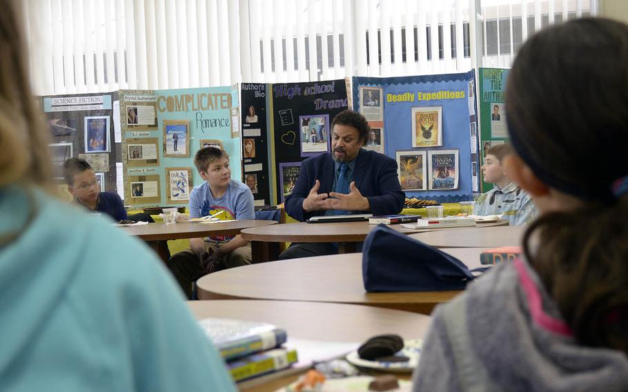 Bestselling author Neal Shusterman answers questions during his visit to Yokosuka Middle School, Japan, Thursday, Jan. 31, 2019.