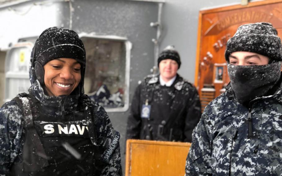 USS Blue Ridge sailors stand watch on board the Navy's oldest operational ship during a port visit in Otaru, Japan, on Friday, Feb. 8, 2019.