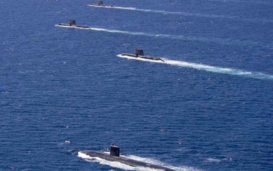 Rear Adm. Jonathan Mead of the Royal Australian Navy on Tuesday, Feb. 19, 2019, tweeted this photo of the USS Santa Fe, foreground, training with four Australian submarines in the Indian Ocean.