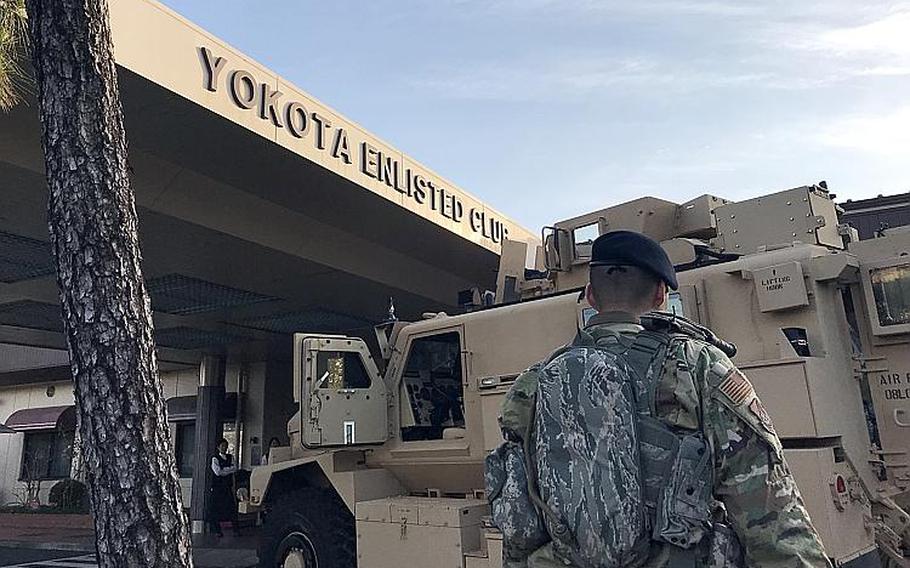 Some airmen wore "battle rattle" and parked an armored truck in front of the Enlisted Club during a readiness-themed prayer breakfast with the Air Force chief of chaplains at Yokota Air Base, Japan, Thursday, Feb. 21, 2019.