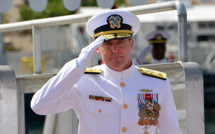 Rear Adm. Blake Converse departs the USS Mississippi after assuming command of U.S. Pacific Fleet Submarine Force at Joint Base Pearl Harbor-Hickam, Hawaii, Thursday, Feb. 21, 2019.