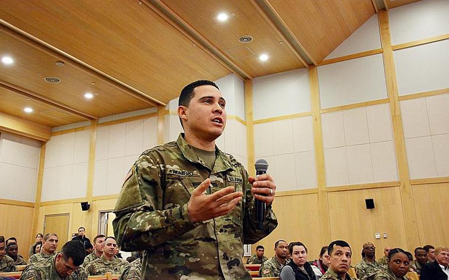 Capt. Carlos Romero of the 176th Financial Support Unit tells commanders about his housing concerns during a town hall meeting at Camp Humphreys, South Korea, Friday, Feb. 22, 2019.