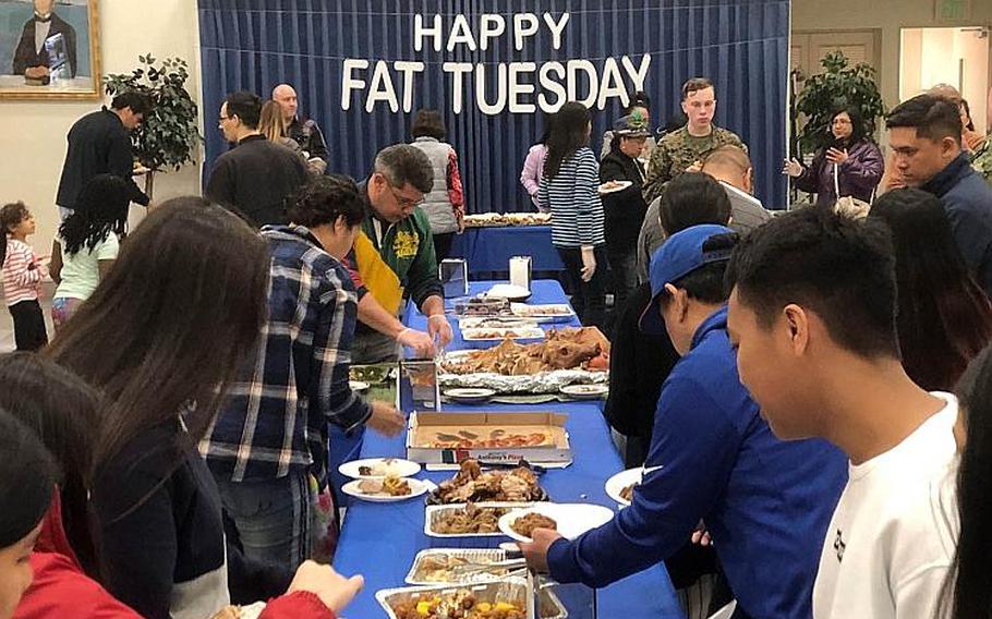 The Chapel of Hope at Yokosuka Naval Base, Japan, hosts a Fat Tuesday feast and celebration, March 5, 2019.