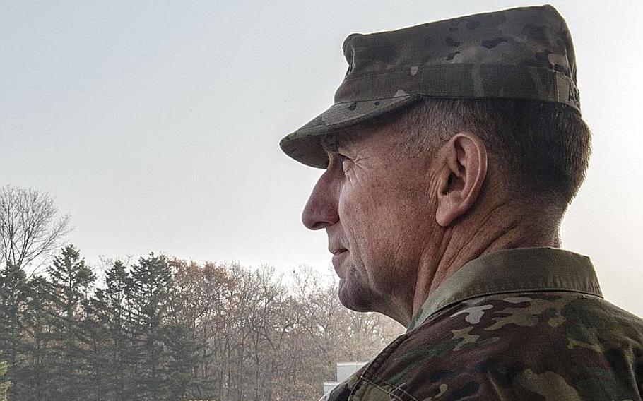Gen. Robert Abrams, commander of U.S. Forces Korea and United Nations Command, looks out over the Joint Security Area of the Korean Demilitarized Zone, Nov. 10, 2018.