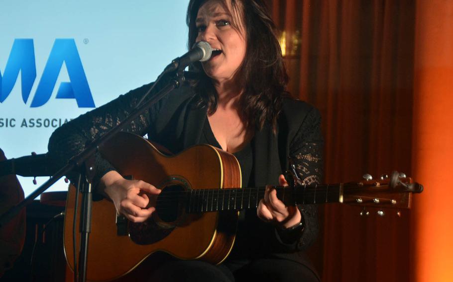 Country music artist Brandy Clark performs at the Tokyo home of Ambassador to Japan William Hagerty on Thursday, March 28, 2019.