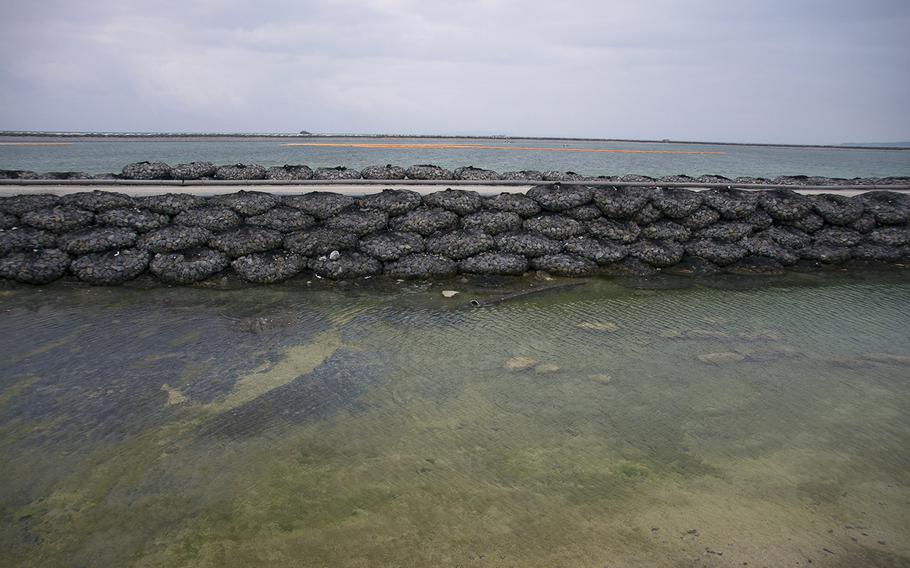 Construction work for a runway that will one day alllow the relocation and closure of Marine Corps Air Station Futenma, Okinawa, continues at Camp Schwab, March 23, 2019.