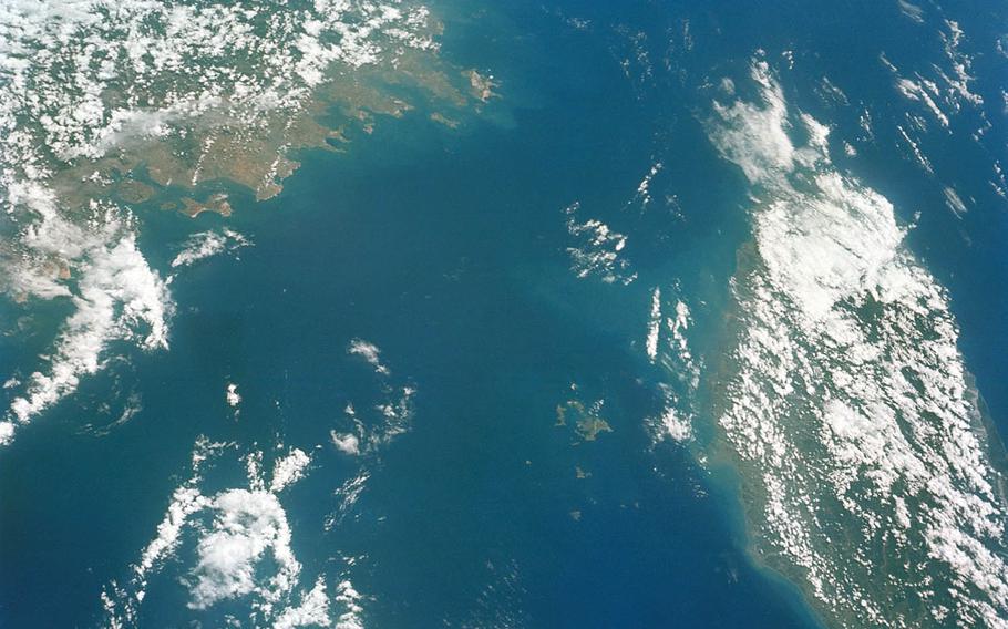 This undated photo taken from space shows the Taiwan Strait between mainland China, at left, and Taiwan.