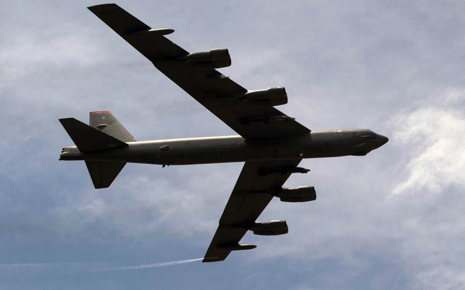 A B-52 Stratofortress of the 23rd Bomb Squadron makes its final pass over the Langkawi International Maritime and Aerospace Exhibition 2019 in Padang Mat Sirat, Malaysia, on March 26, 2019.