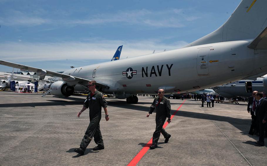 A U.S. Navy P-8A Poseidon sits on display at the 2019 Langkawi International Maritime and Aerospace Exhibition at Padang Mat Sirat, Malaysia, March 26, 2019.