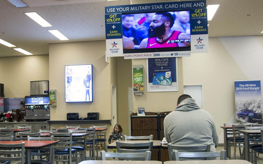 A patron dines at the Army and Air Force Exchange Service food court at Yokota Air Base on Wednesday, April 10, 2019.