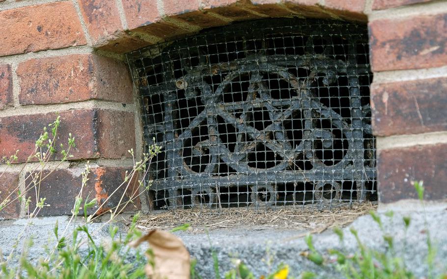 Japanese symbols in a ventilation opening are preserved after 110 years at the historic Japanese stockade inside Yongsan Garrison, South Korea, on Tuesday, April 9, 2019.