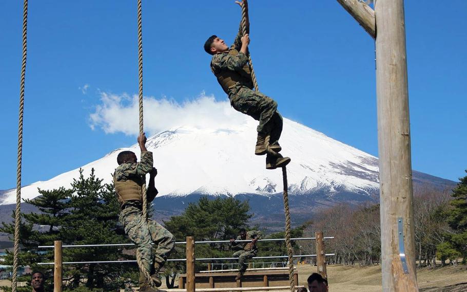 Mount Fuji provides the backdrop to Marine Corps martial arts training at Combined Arms Training Center Camp Fuji, Gotemba, Japan, on Wednesday, April 10, 2019.