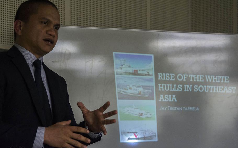 Lt. Cmdr. Jay Tarriela of the Philippine Coast Guard speaks about the increasing numbers and missions of coast guards in the region during a Yokosuka Council on Asia-Pacific Studies meeting in Fussa, Japan, April 18, 2019.