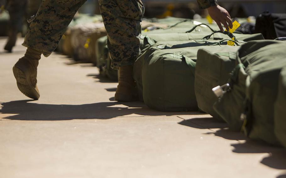 Marines arrive at a Royal Australian Air Force base in Darwin, Australia, for a rotation Down Under, April 12, 2019.