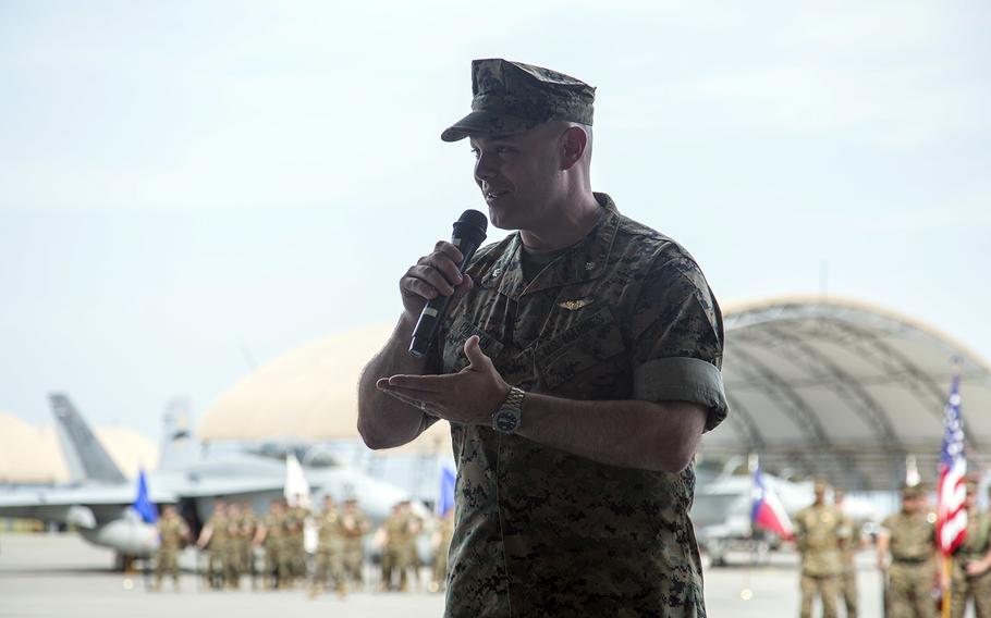 Marine Corps Lt. Col. James Compton, commander of Marine All Weather Fighter Attack Squadron 242, speaks at Marine Corps Air Station Iwakuni, Japan, May 25, 2018.
