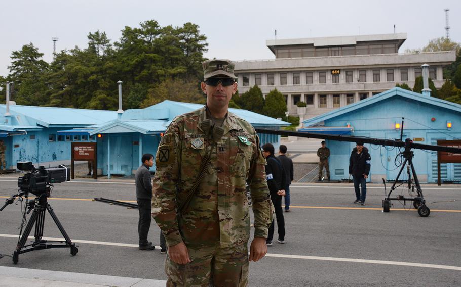 Army Capt. Matthew Sturgis of the United Nations Command Security Battalion poses during celebrations of the first anniversary of the first inter-Korean summit in the truce village of Panmunjom, Saturday, April 27, 2019.