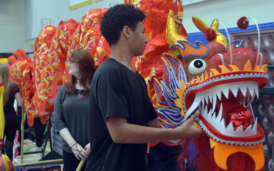 Yokota High School students prepare for a performance during their Asian American Pacific Islander Heritage Month celebration at the air base in western Tokyo, Monday, May 6, 2019.