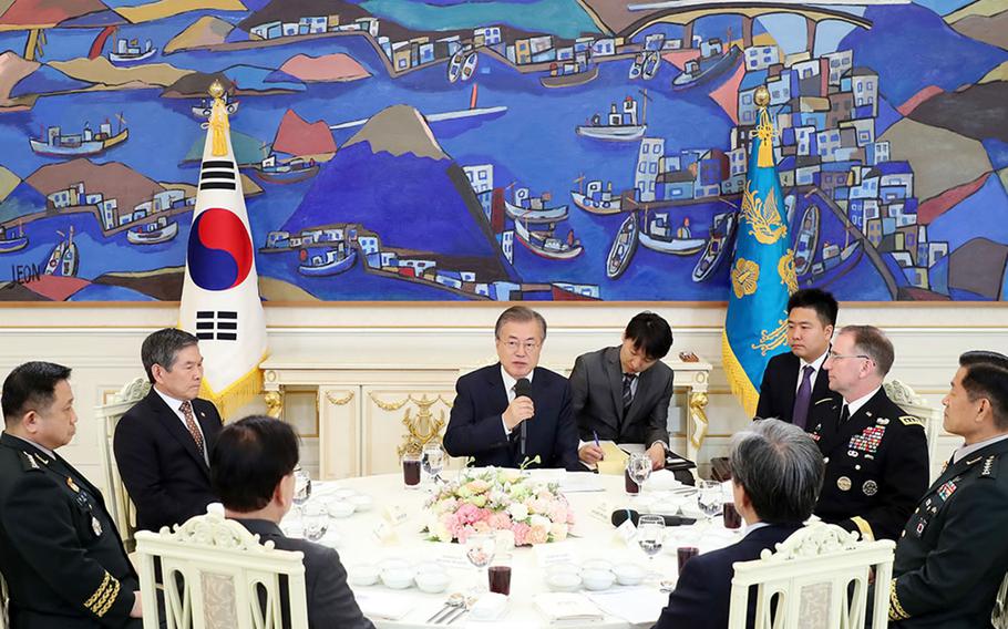 South Korean President Moon Jae-in, center, meets with U.S. Forces Korea commander Gen. Robert Abrams and other military leaders at the presidential palace in Seoul, South Korea, Tuesday, May 21, 2019.