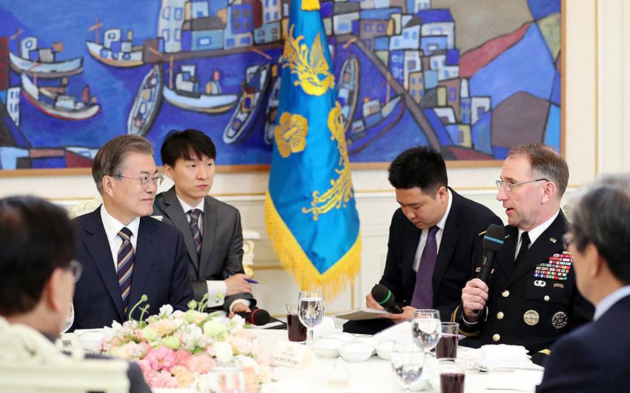 South Korean President Moon Jae-in meets with U.S. Forces Korea commander Gen. Robert Abrams and other military leaders at the presidential palace in Seoul, South Korea, Tuesday, May 21, 2019.