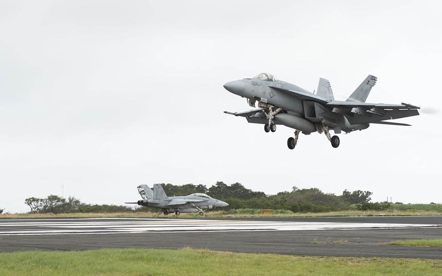 F/A-18s from Carrier Air Wing 5 at Marine Corps Air Station Iwakuni, Japan, take part in field carrier-landing practice at Iwo Jima, Japan, May 17, 2019.