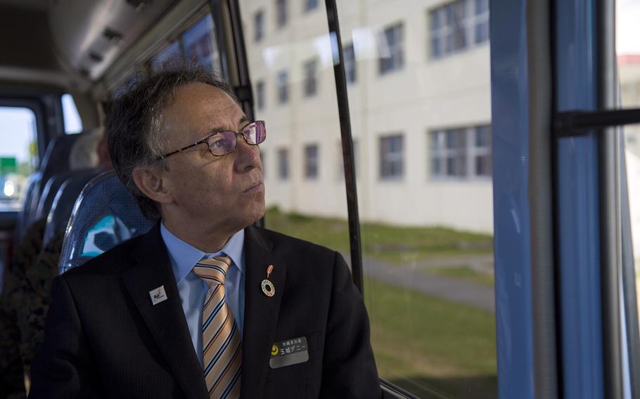 Okinawa Gov. Denny Tamaki takes a tour of Camp Kinser, Okinawa, Jan. 31, 2019.