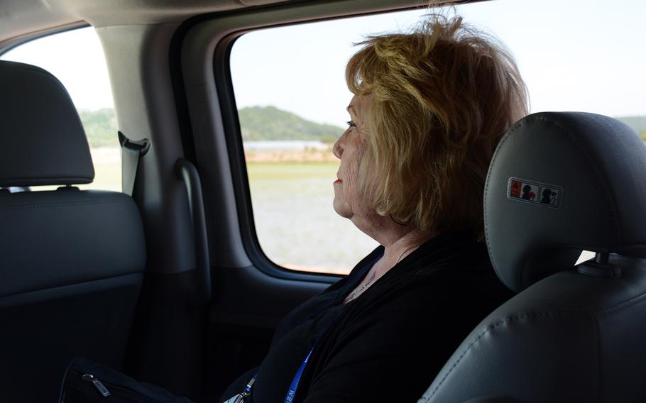 Judith Britton of Hobbs, N.M., joined other relatives of missing American servicemembers in a visit to the Korean War battleground known as Arrowhead Hill, May 29, 2019, for a rare view of the site in the Demilitarized Zone where South Korea is searching for remains.