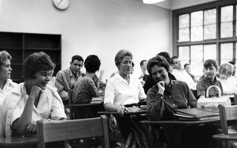 Seoul American High School students are captured giggling in class in this photo published in a Dec. 3, 1960, edition of Stars and Stripes.