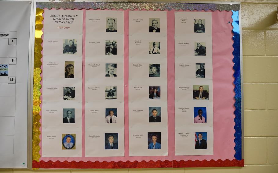 A bulletin board showing all the Seoul American High School principals since the school opened 60 years ago is seen on the campus at Yongsan Garrison, South Korea, Wednesday, June 5, 2019.