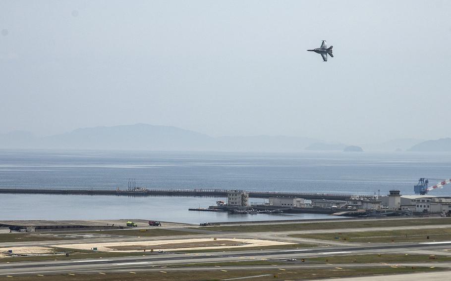 An F/A-18F Super Hornet from Carrier Air Wing 5 maneuvers over Marine Corps Air Station Iwakuni, Japan, during an open-base event on May 5, 2019.