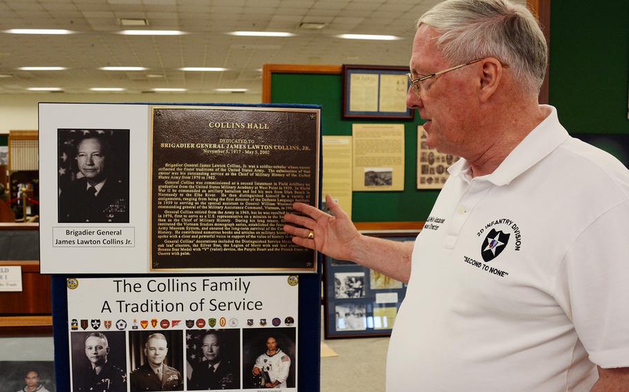 Retired Col. Michael Alexander, historian and curator of the new 2nd Infantry Division/Eighth Army/Korean Theater of Operations museum at Camp Humphreys, South Korea, explains a display about the Collins family  Wednesday, June 5, 2019. The family includes Michael Collins, who took his father's Indianhead patch to the moon.