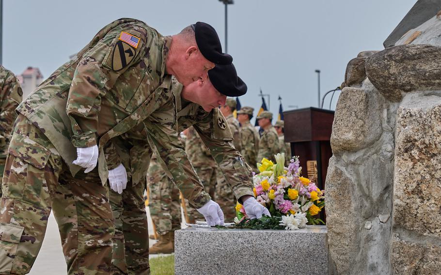 Eighth Army commander Lt. Gen. Michael Bills and Command Sgt. Maj. Jason Schmidt honor fallen Korean Service Corps members during a monument rededication ceremony at Camp Humphreys, South Korea, June 9, 2019.