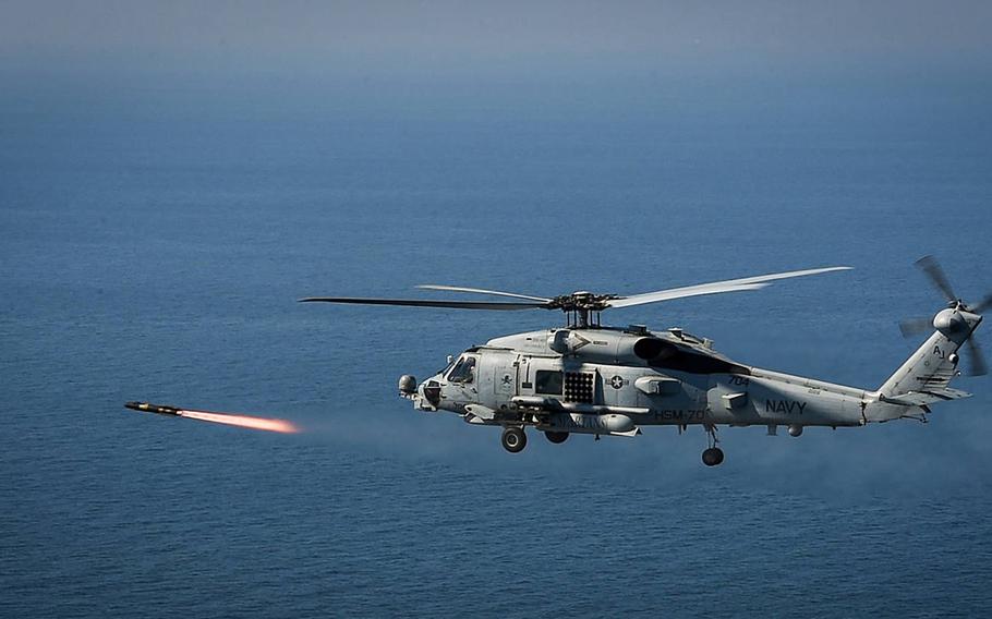 A Navy MH-60R Seahawk helicopter of Helicopter Maritime Strike Squadron 70 shoots an AGM-114N Hellfire missile during exercise BALTOPS in the Baltic Sea, June 14, 2019.