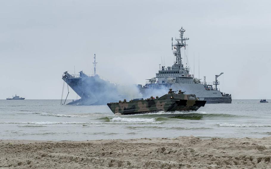 A Polish Area Landing Craft delivers Spanish, Romanian and U.S. Marines to the beach at Palanga, Lithuania, June 16, 2019, during Exercise Baltic Operations, known as BALTOPS.