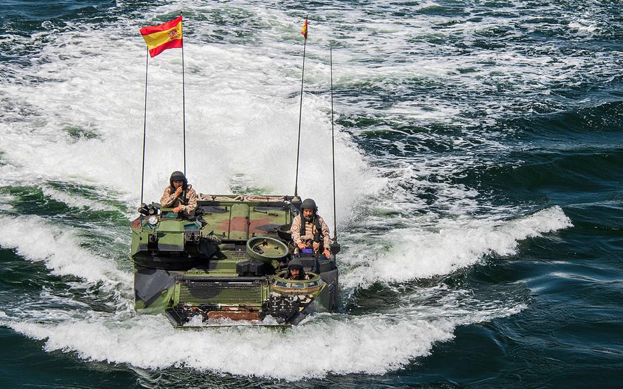 A Spanish marine amphibious assault vehicle prepares to embark the well deck of the amphibious dock landing ship USS Fort McHenry in the Baltic Sea, June 15, 2019. The marines are part of the international forces participating in the Baltic Operations, or BALTOPS, exercise.