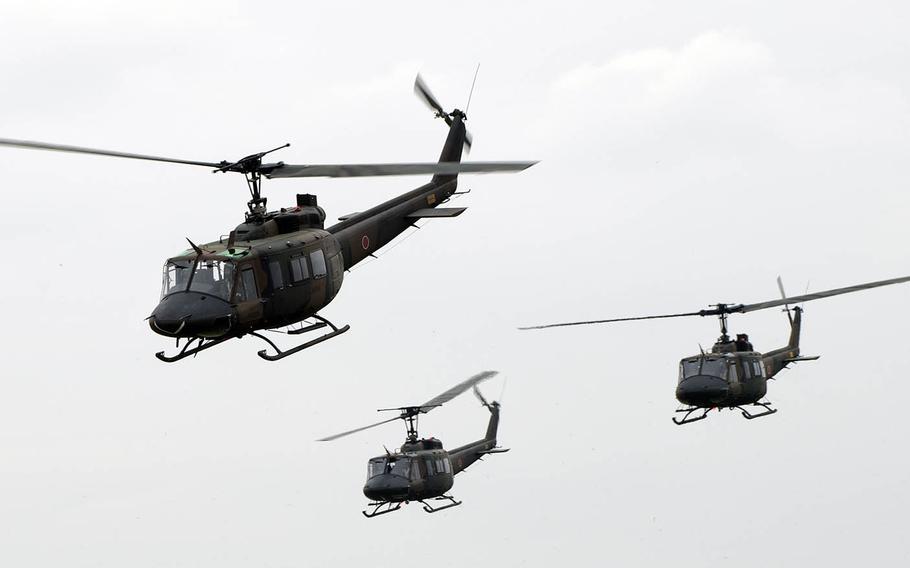 UH-1Js from the Japan Ground Self-Defense Force fly in formation over Camp Tachikawa in western Tokyo, Oct. 1, 2016.