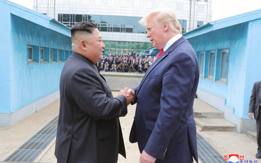 U.S. President Donald Trump greets North Korean leader Kim Jong Un at the Joint Security Area on Sunday, June 30, 2019.