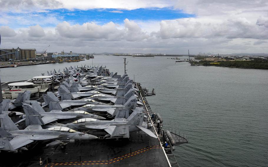 The USS Ronald Reagan steams toward Brisbane, Australia, Friday, July 5, 2019. The Japan-based aircraft carrier is slated to participate in the Talisman Sabre exercise this month.