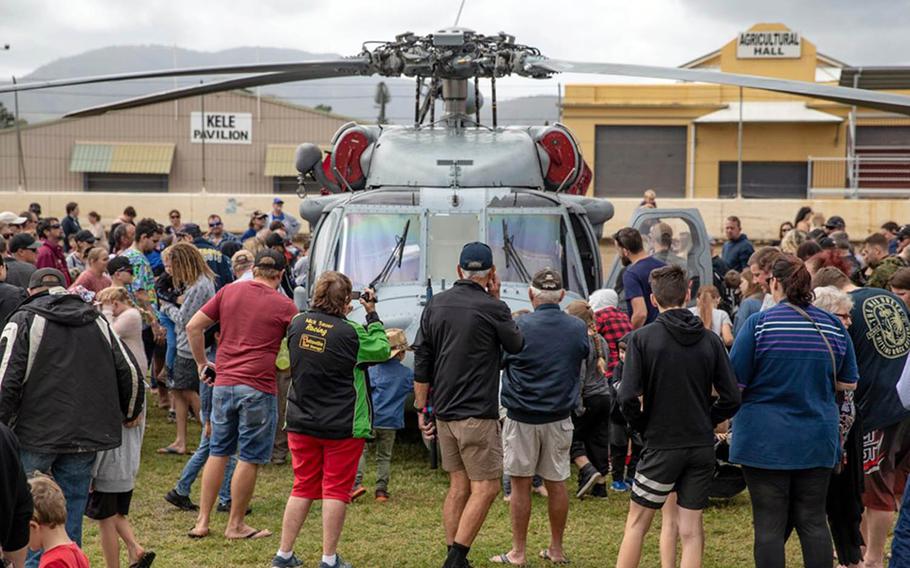 Locals check out an SH-60 Seahawk during the Exercise Talisman Sabre Open Day in Rockhampton, Australia, Saturday, July 6, 2019.