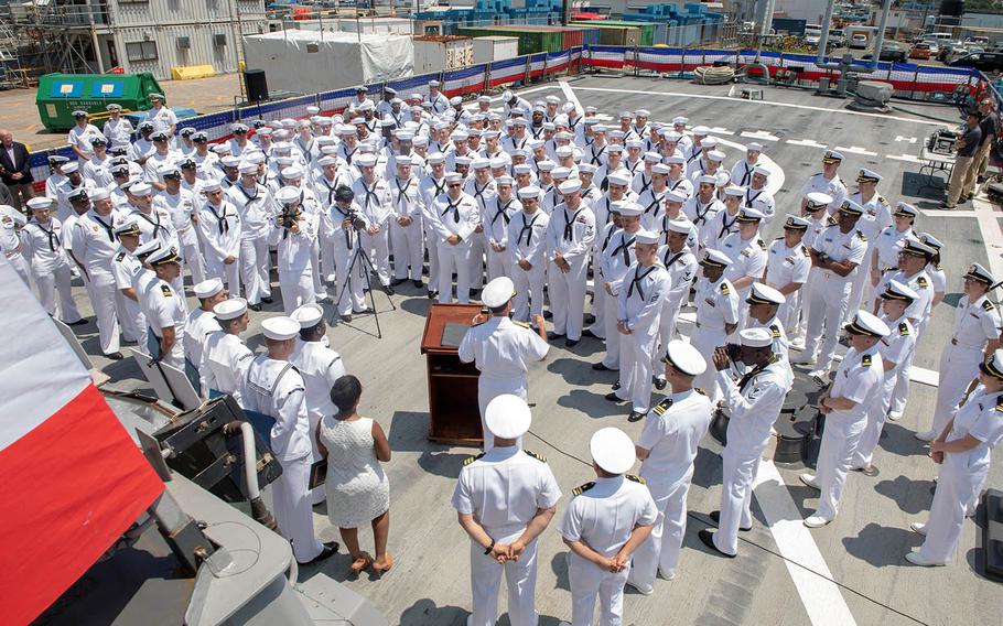 USS John S. McCain sailors listen to Adm. John Aquilino, U.S. Pacific Fleet commander, during an awards ceremony aboard the guided-missile destroyer at Yokosuka Naval Base, Japan, Wednesday, July 10, 2019.