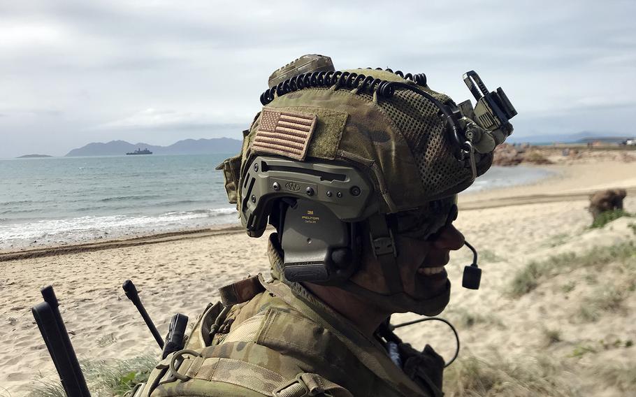 Australian army Capt. Chris Moroney, 32, of Brisbane, Australia, wore a U.S. flag patch on his helmet during an amphibious Talisman Sabre drill near Bowen, Australia, Monday, July 22, 2019.