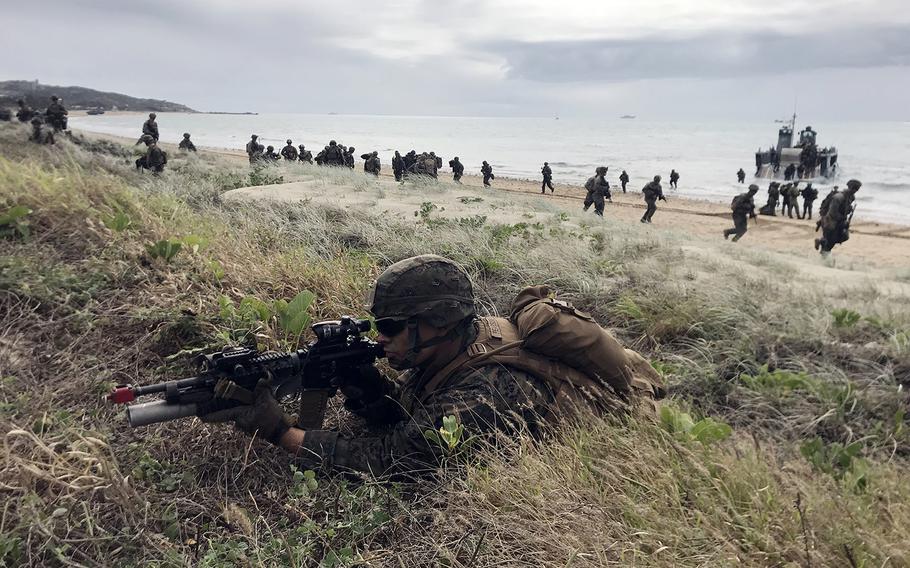 Marines secure Kings Beach near the Australian town of Bowen during an amphibious drill that was part of the monthlong Talisman Sabre exercise, Monday, July 22, 2019.